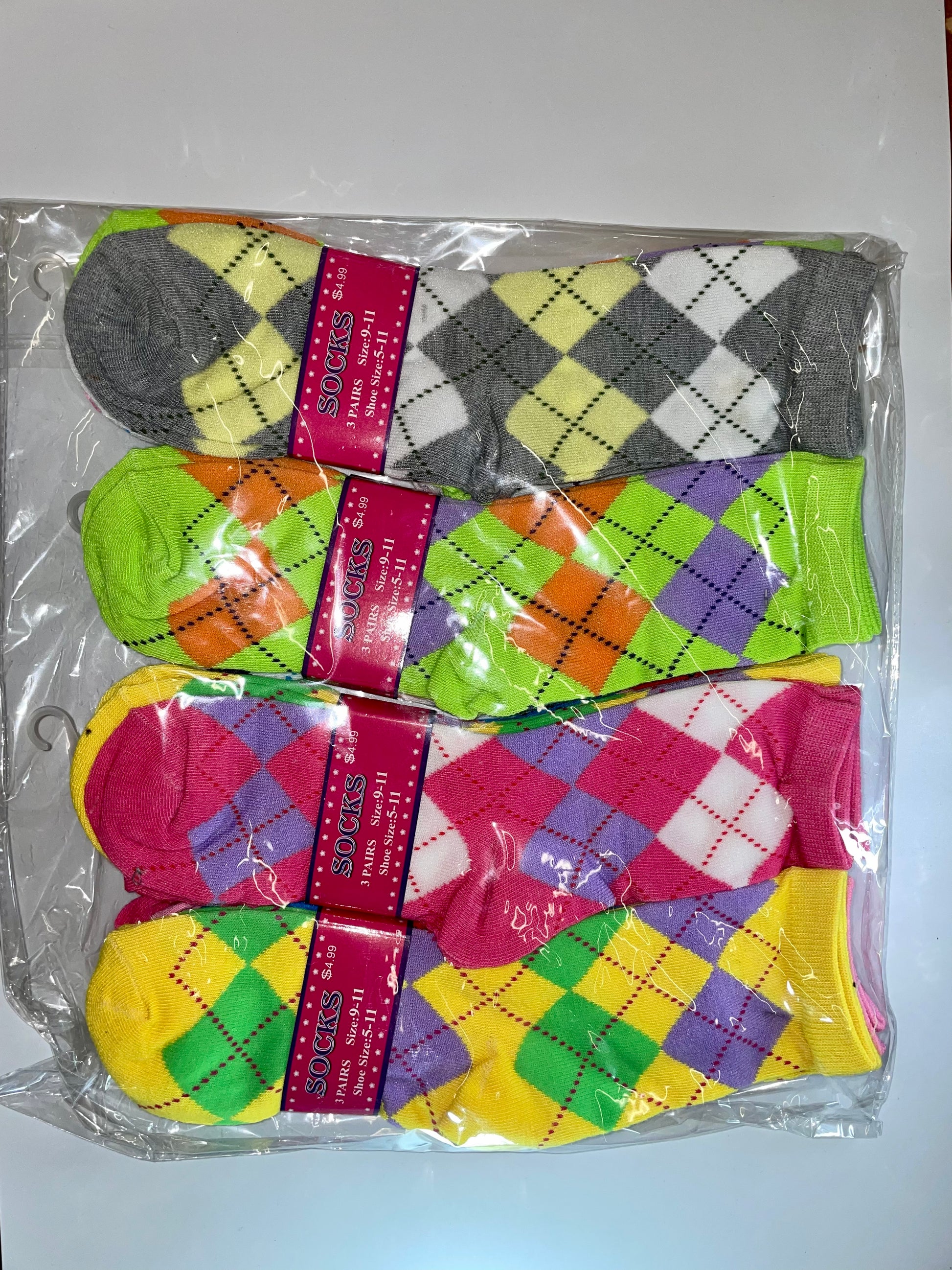 "Women's crew socks with a geometric pattern and a stretchy fit"