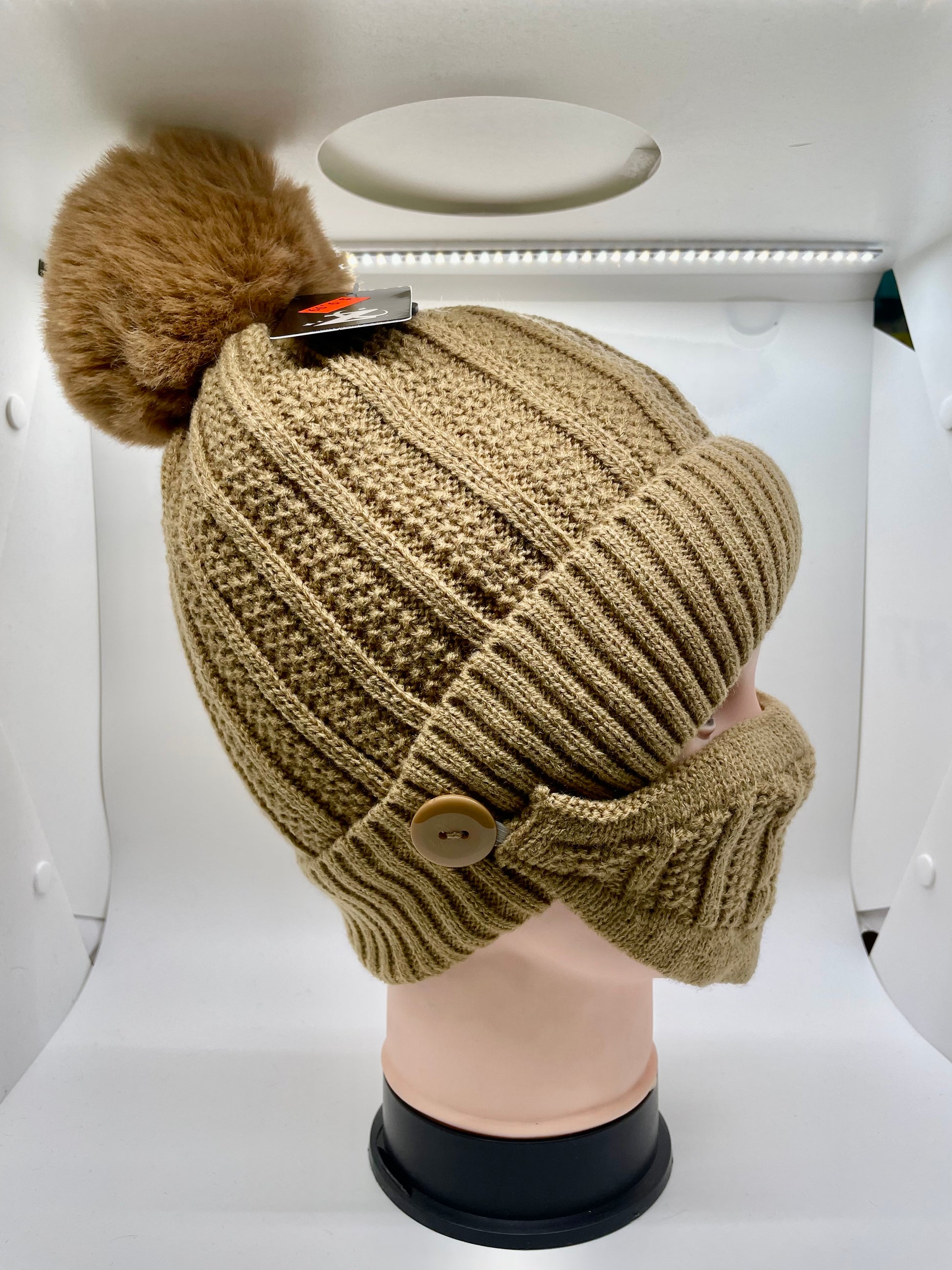 "Brown toboggan hat with mask and a padded headband"