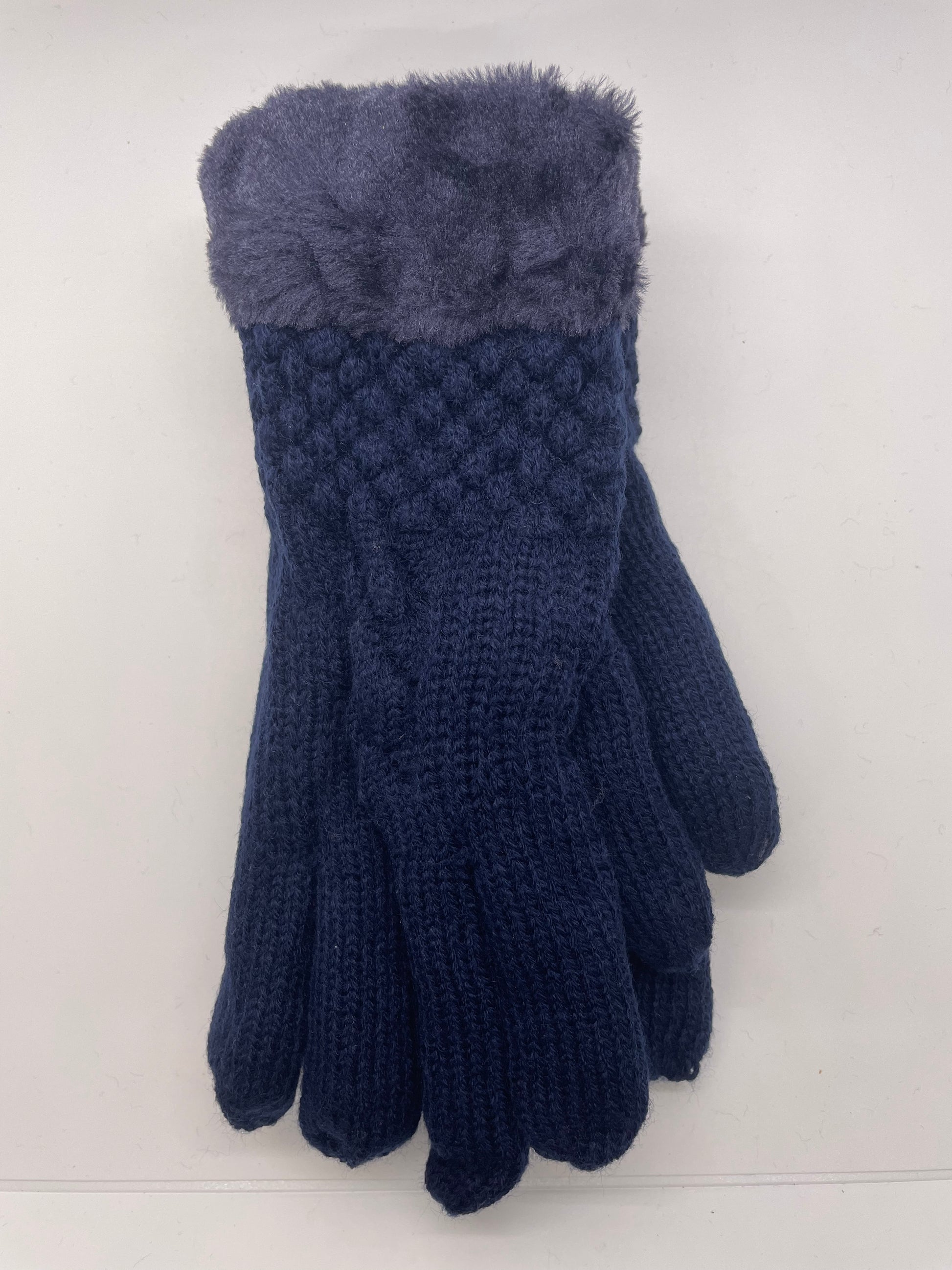 Navy blue women's winter gloves with a quilted texture