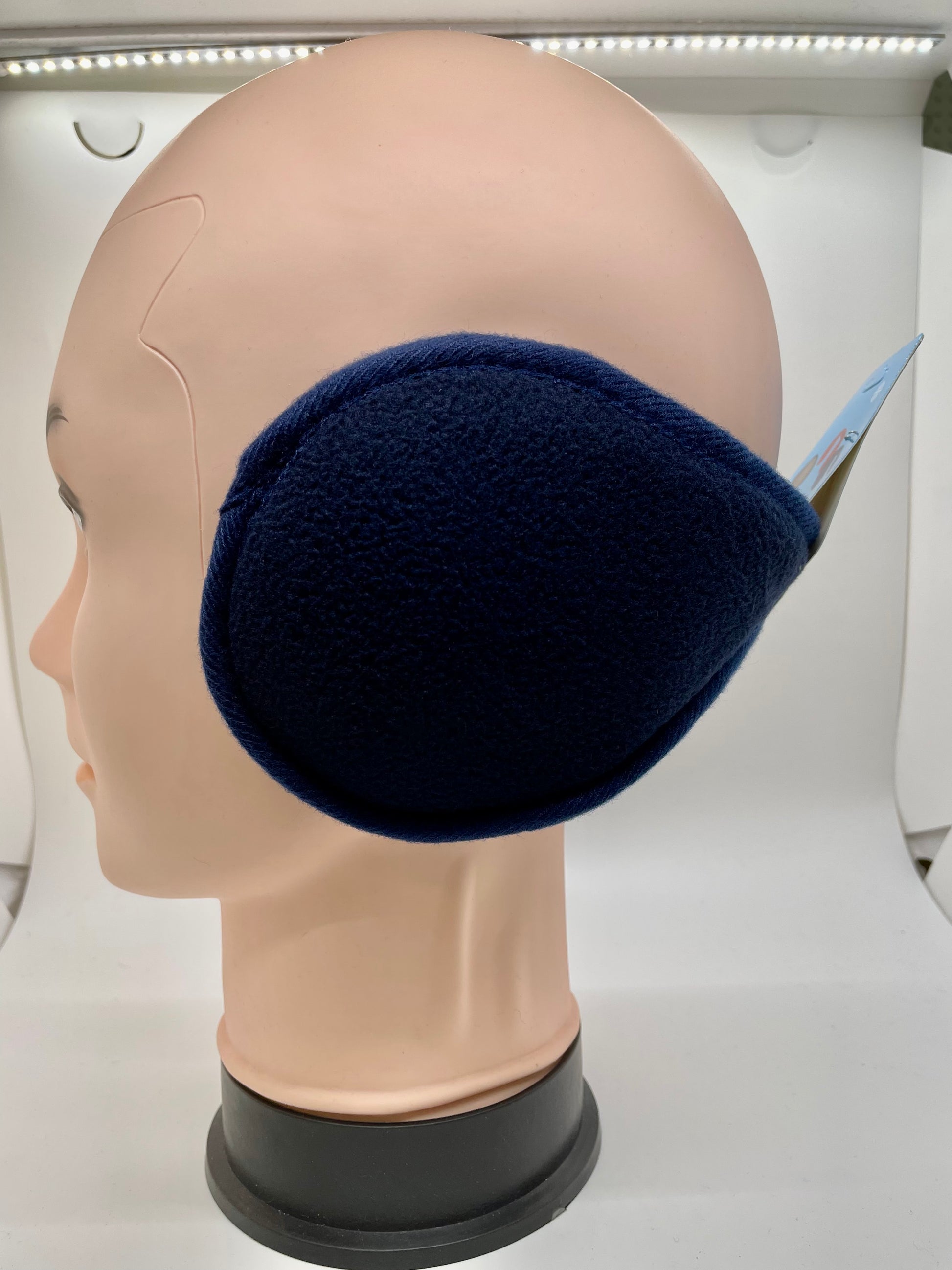 Navy blue ear muff with a quilted texture and a fold-over cuff
