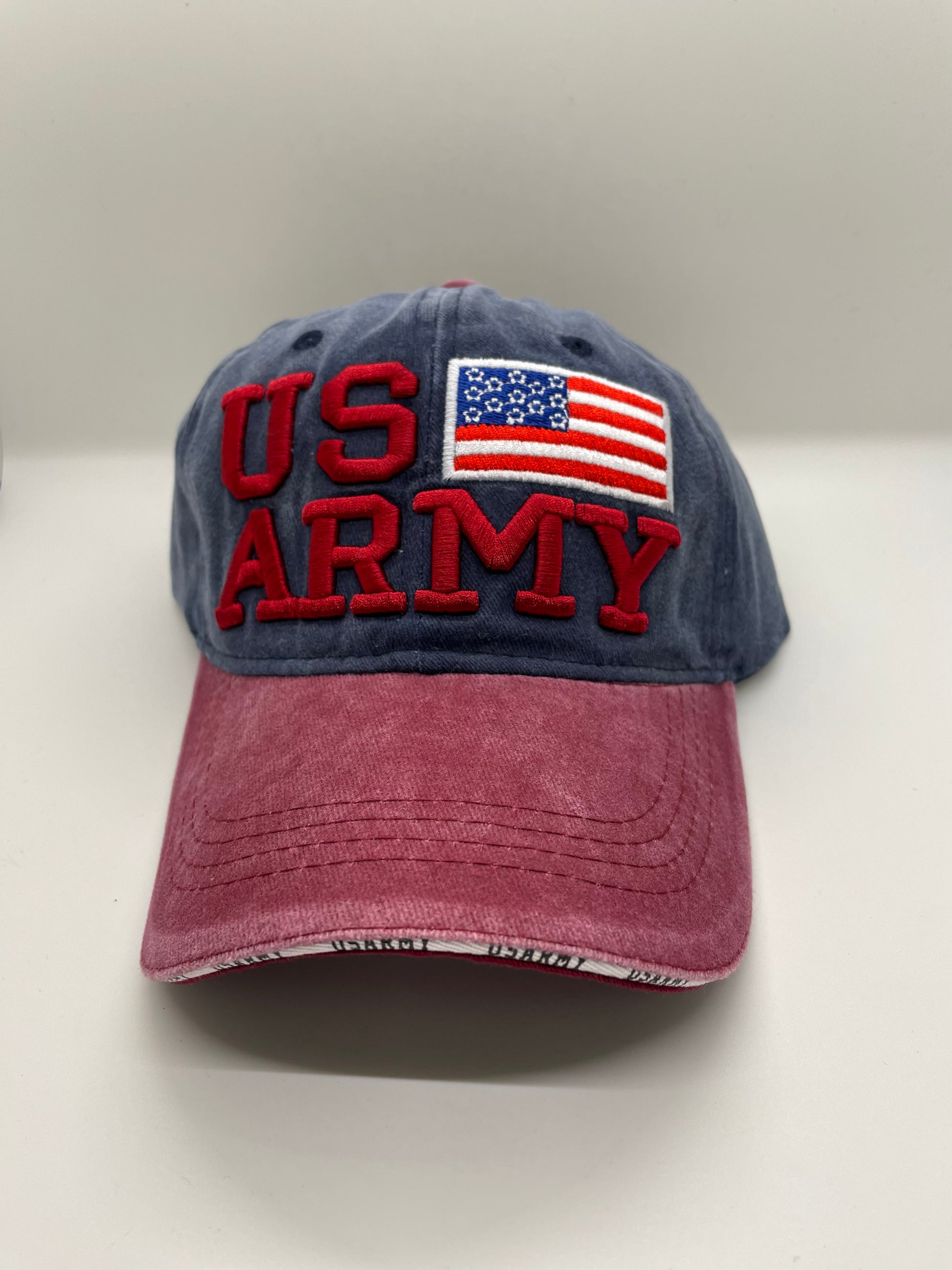 "Gray US Army hat with a ribbed knit texture and a buckle closure"