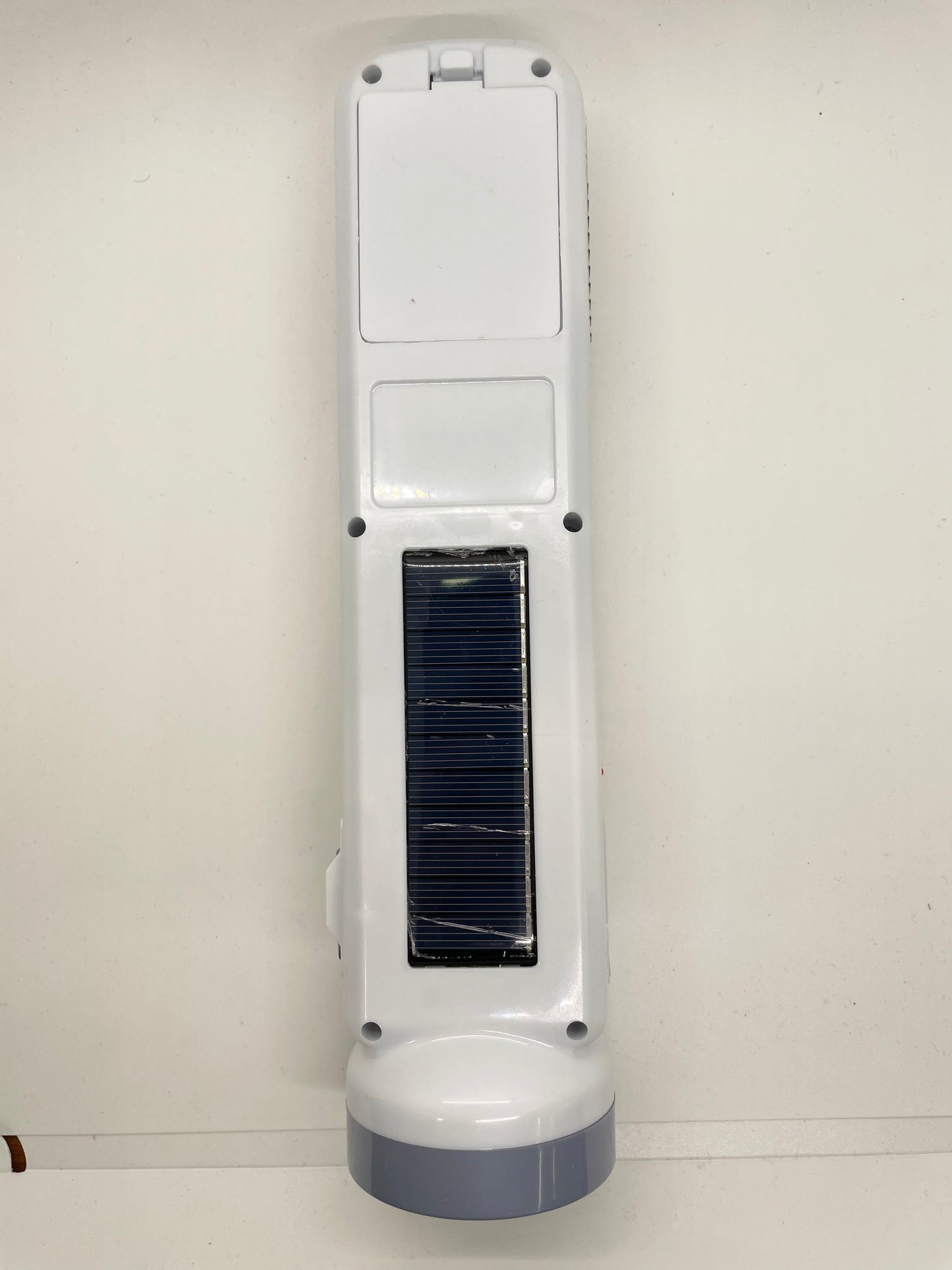 Solar powered rechargable flashlight