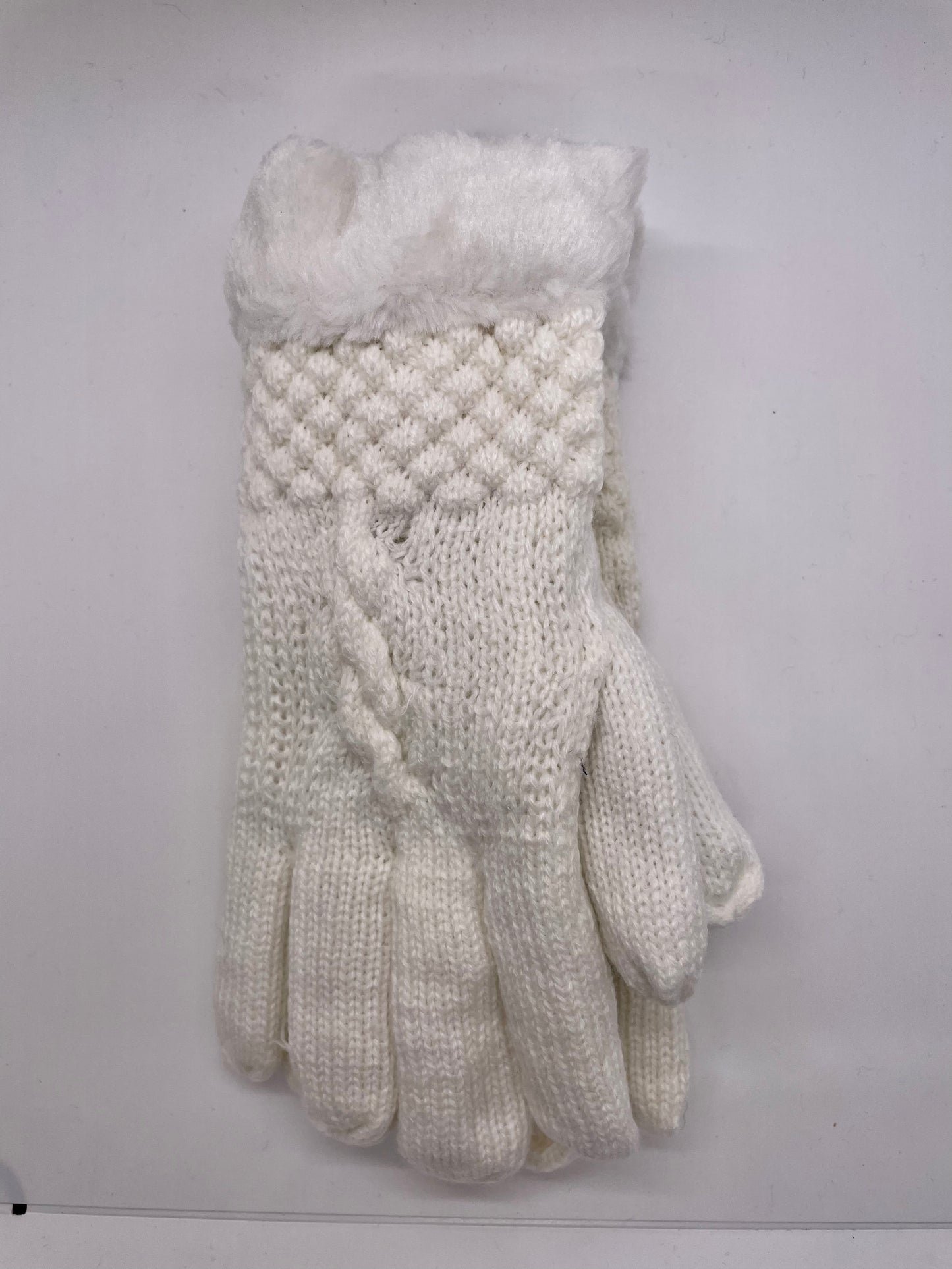 White women's winter gloves with a knit texture and a durable design