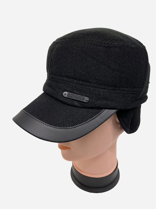 "Black winter hat with ear flaps and a moisture-wicking design"